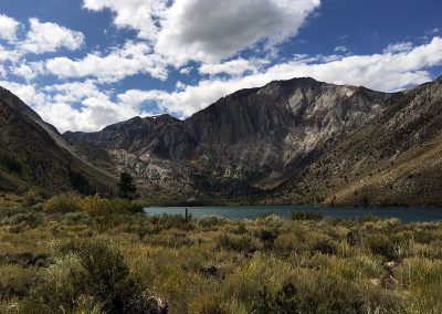 Sunny day at Convict Lake starts to get partly cloudy