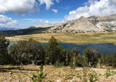 Marmots live in the rocks at the lake outlet